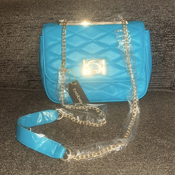 bebe Handbags - NWT BEBE ABSOLUTELY STUNNING AQUA COLOR CROSSBODY BAG!!! She is GORGEOUS!!!⭐️😍